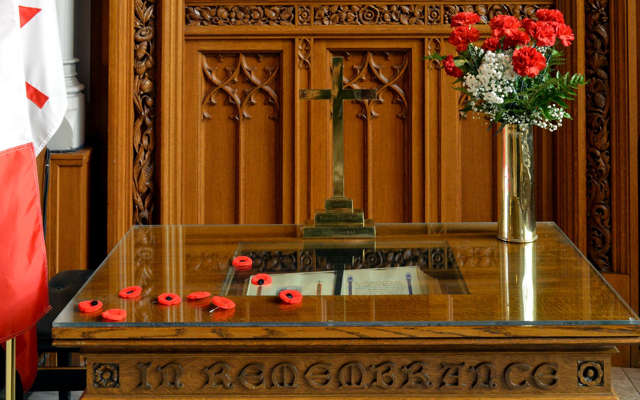 Poppies spread over the In Memoriam Table
